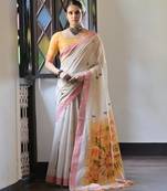 Mustard muga cotton saree with warli weaving pallu, contrast border & handwoven butta design | with blouse