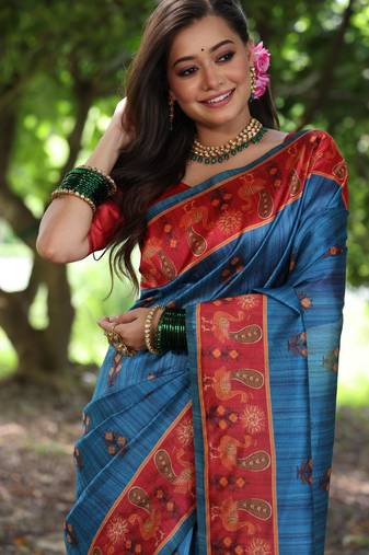 blue soft tussar art silk peacock design saree with traditional printed pallu & contrast border – with blouse