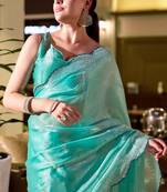 Turquoise embroidery work shimmer chiffon saree with unstitched blouse