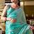 Turquoise embroidery work shimmer chiffon saree with unstitched blouse