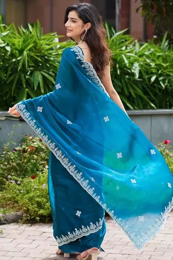 Teal embroidery work shimmer chiffon saree with unstitched blouse