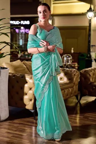 Turquoise embroidery work shimmer chiffon saree with unstitched blouse