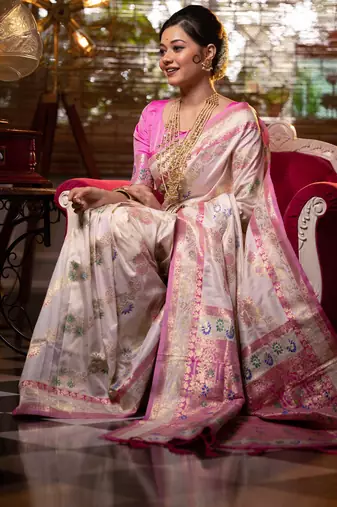 off white banarasi silk blend saree with meena weaves, contrast border, grand weaving pallu & tassels with blouse