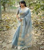 Sky blue soft kalyani silk saree with zari woven checks pattern, rich pallu & running blouse     elegant party wear