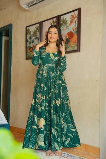 Green color heavy rayon fully flared anarkali gown with half inner