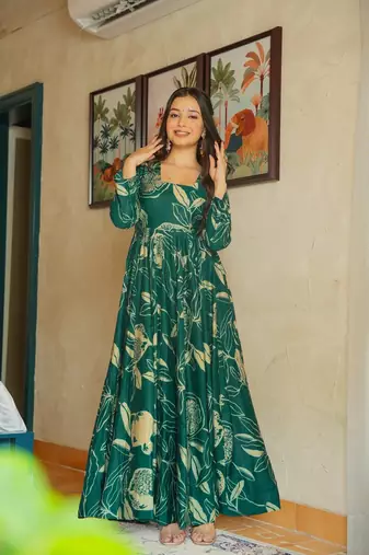 Green color heavy rayon fully flared anarkali gown with half inner