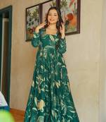 Green color heavy rayon fully flared anarkali gown with half inner