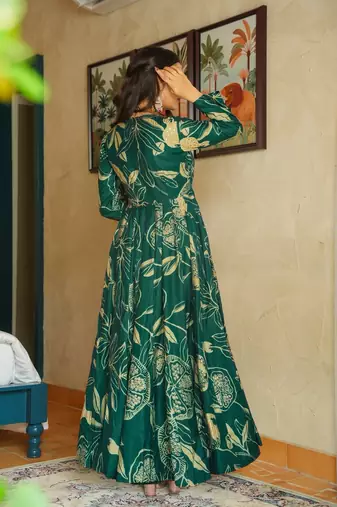 Green color heavy rayon fully flared anarkali gown with half inner