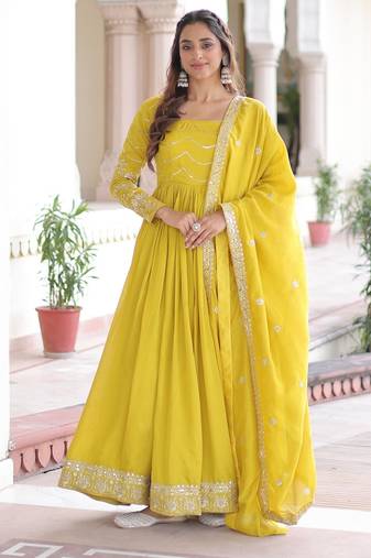 Yellow vichitra silk sequins embroidered flared gown with heavy dupatta