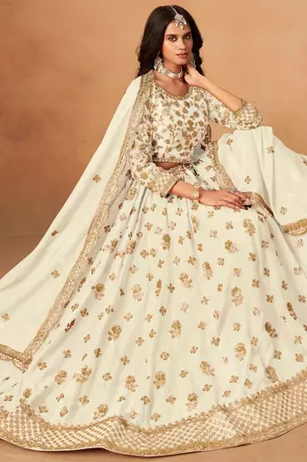 white organza lehenga set with choli and dupatta