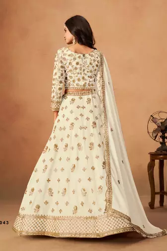 white organza lehenga set with choli and dupatta