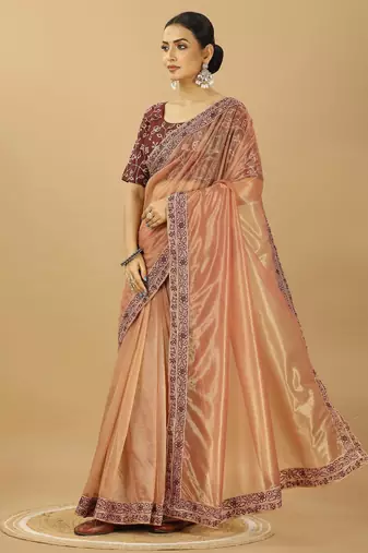 beige net saree with embroidered border & silk blouse