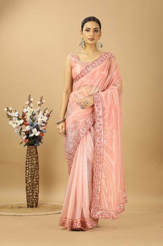 peach net embroidered saree with designer blouse