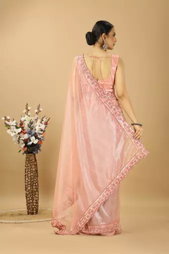 peach net embroidered saree with designer blouse