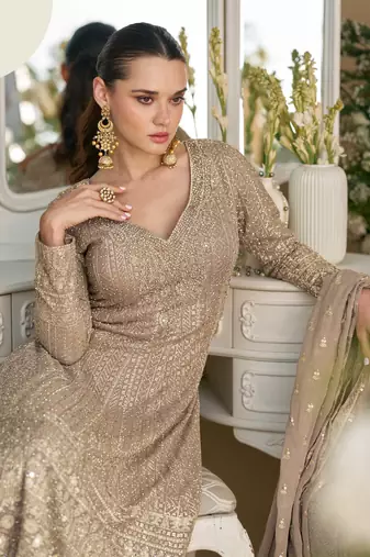 Beige embroidery sequins & stone georgette anarkali palazzo suit-- Full stitched free size.