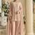 Light peach georgette and net embroidered beads work salwar suit