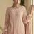 Light peach georgette and net embroidered beads work salwar suit