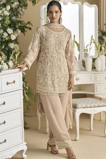 Beige georgette and net embroidered beads work salwar suit
