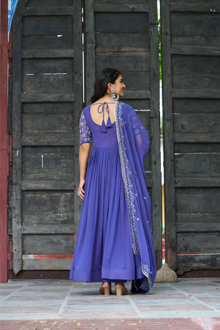 Lavender faux georgette sequins multithreaded beads embroidered flared gown with heavy dupatta
