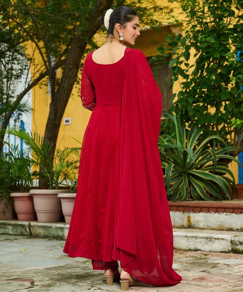 Maroon faux georgette bead embroidered flared gown with pant and heavy dupatta