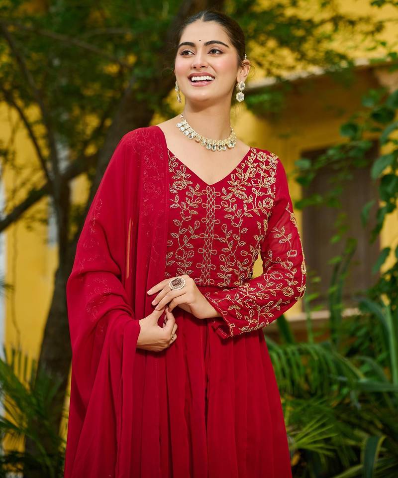Maroon faux georgette bead embroidered flared gown with pant and heavy dupatta