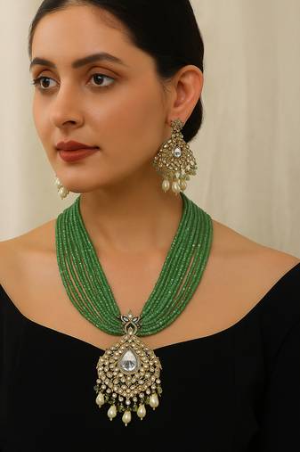 Elegant green beaded kundan necklace set with pearl drops