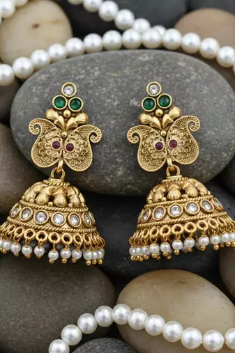 Majestic gold-toned peacock pendant antique kundan necklace set with jhumka earrings