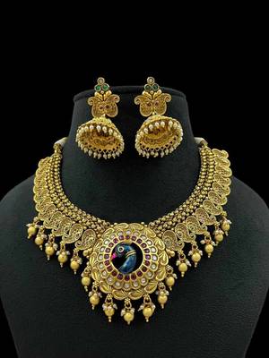 Majestic gold-toned peacock pendant antique kundan necklace set with jhumka earrings 3
