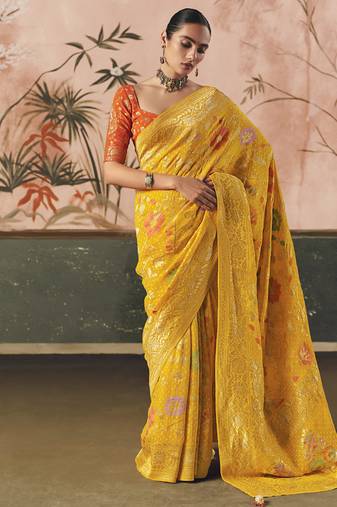 Yellow khadi georgette with designer weaving work & beautiful tassels bandhani saree