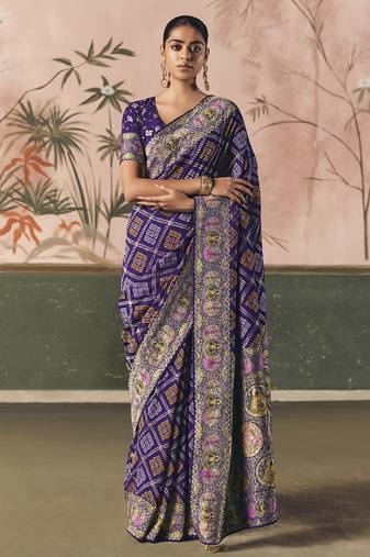 Purple khadi georgette with designer weaving work & beautiful tassels bandhani saree