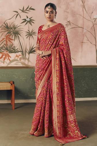 Red khadi georgette with designer weaving work & beautiful tassels bandhani saree