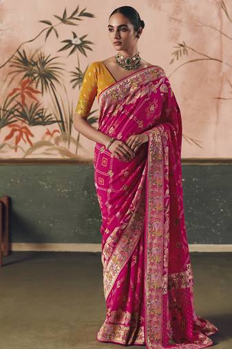 Rani pink khadi georgette with designer weaving work & beautiful tassels bandhani saree