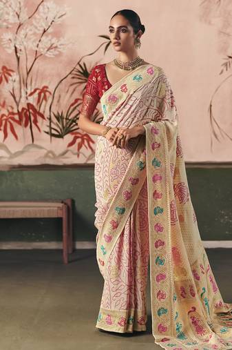 Off-white khadi georgette with designer weaving work & beautiful tassels bandhani saree