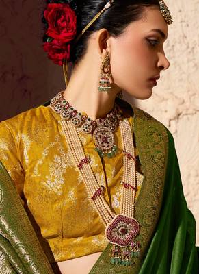 olive green viscose silk blend with zari weaving & tassel with brocade blouse  3