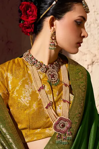 olive green viscose silk blend with zari weaving & tassel with brocade blouse 