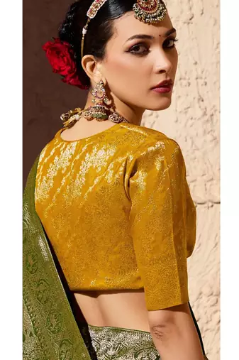olive green viscose silk blend with zari weaving & tassel with brocade blouse 