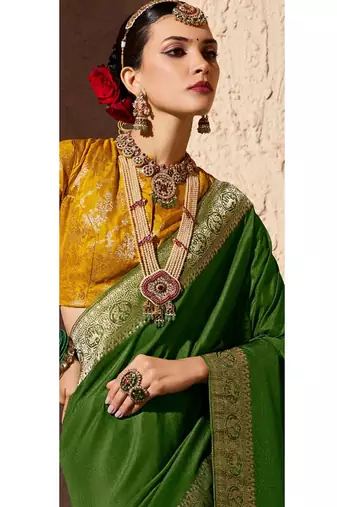 olive green viscose silk blend with zari weaving & tassel with brocade blouse 