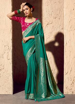turquoise viscose silk blend with zari weaving & tassel with brocade blouse  1