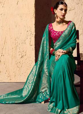 turquoise viscose silk blend with zari weaving & tassel with brocade blouse  2