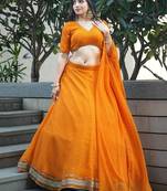 ORANGE ZARI AND CODING LACE WORK WITH LEHERIYA PRINTED GEORGETTE PARTY SEMI STITCHED LEHENGA CHOLI