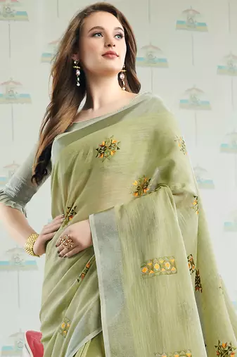 Pista green color linen embroidered work saree