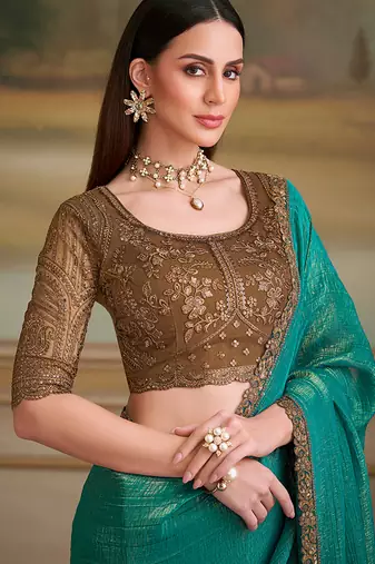 Turquoise gold faux georgette embroidered border saree