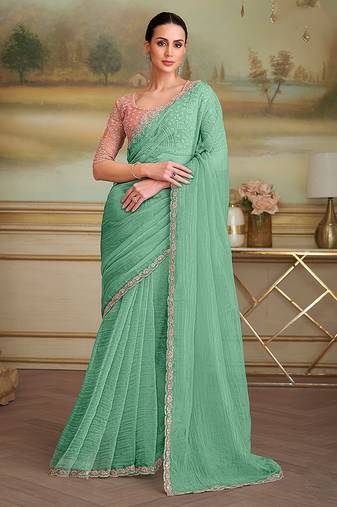 Sea green tissue faux georgette embroidered border party trendy saree