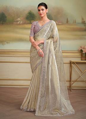 Beige faux georgette embroidered border saree 1