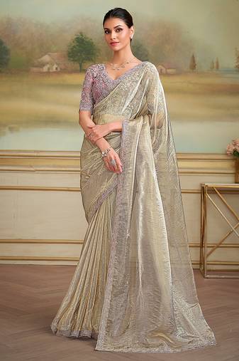 Beige faux georgette embroidered border party trendy saree
