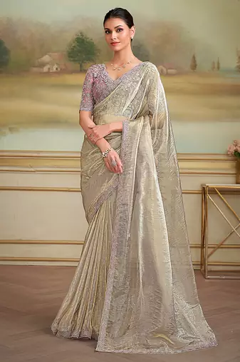 Beige faux georgette embroidered border party trendy saree