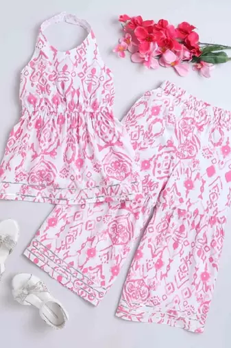 Pink ikat printed soft crepe kids halter neck top with flared pants co-ord set | stylish summer casual wear for girls
