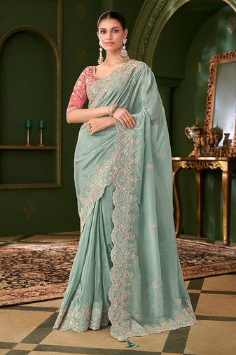 Light sea green color viscose faux georgette silk embroidered saree with heavy work blouse