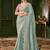 Light sea green color viscose faux georgette silk embroidered saree with heavy work blouse