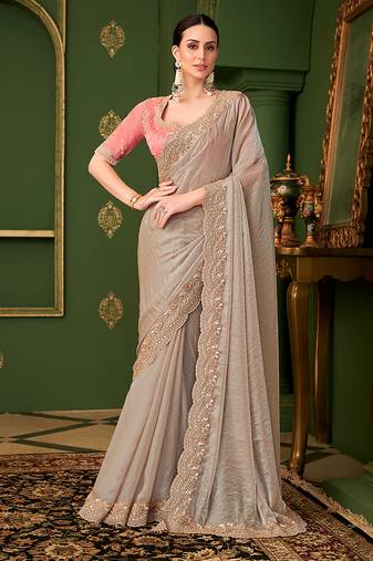 Chiku color faux satin georgette silk embroidered saree with heavy work blouse